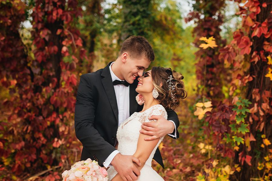 happy couple at fall wedding